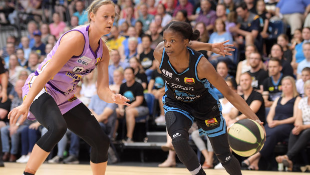 Frenchwoman Olivia Epoupa, right, put on a great performance to propel the Canberra Capitals into the WNBL grand final.