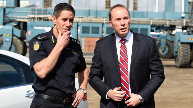 Now Home Affairs Minister Peter Dutton (right) and former Australian Border Force commissioner Roman Quaedvlieg prepare to inspect the yacht Solay in Brisbane on Thursday, September 3, 2015.