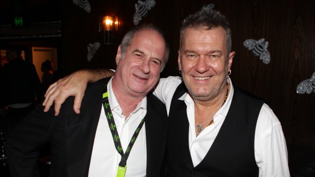 Michael Gudinski with Jimmy Barnes in Sydney in 2013. 