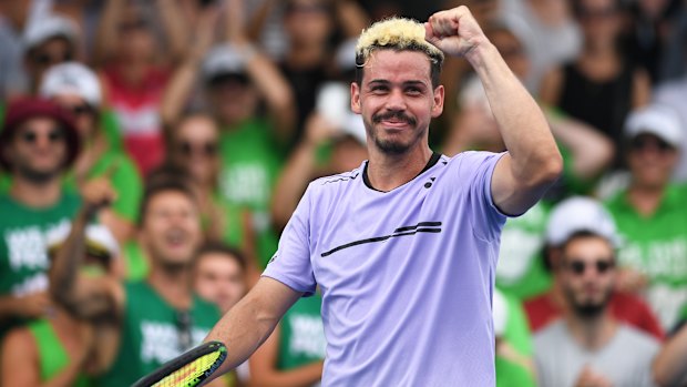 Alex Bolt celebrates with the crowd after defeating Jack Sock.