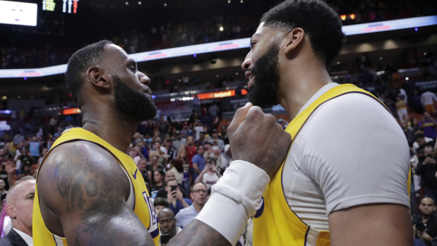 LeBron James and Anthony Davis after the Lakers' match against the Miami Heat on Friday. James chartered a flight the next day.