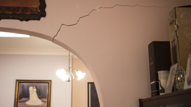 He heard a splitting noise when a crack above an archway in his lounge room appeared. 