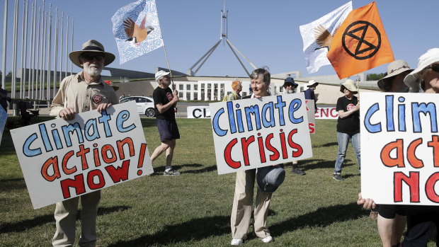 Protesters rallied at Parliament House on Monday calling for more action on climate change.