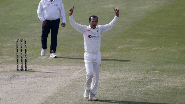 Pakistan’s Nauman Ali after grabbing the wicket of Pat Cummins standing next to the Rawalpindi pitch. 