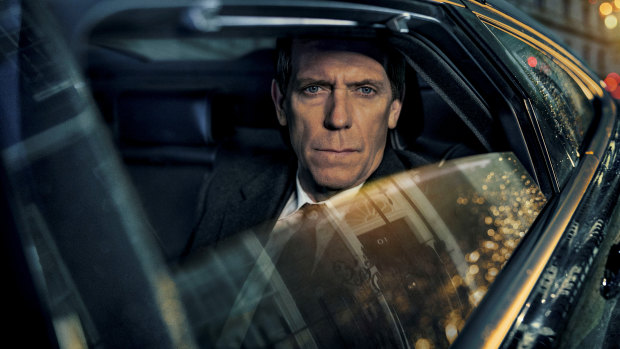 Hugh Laurie plays embattled politician Peter Laurence in the BBC1 drama Roadkill.