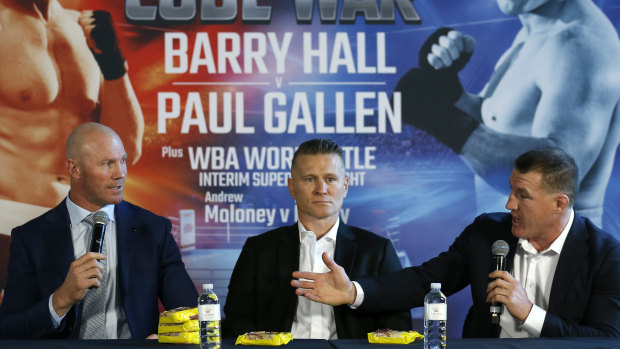 Jousting: Things heat up between Barry Hall and Paul Gallen while Danny Green watches on at their joint press conference at the Crown Promenade.