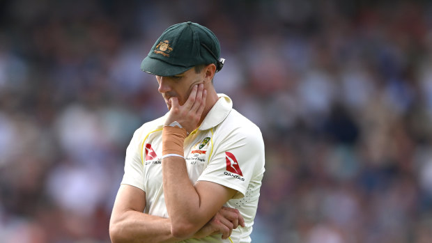 Pat Cummins had his left wrist strapped after an injury on day one of the fifth Test at the Oval.