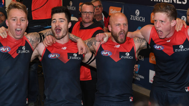 The Demons butcher their club song after defeating Geelong.