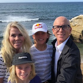 A younger Palmer (second from right) with his father.