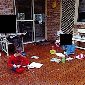 The five photos show William and another child sitting on a veranda drawing. 