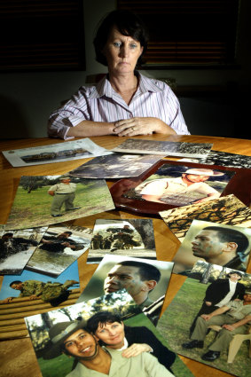 Madonna Palmer with photographs of her son Damien, who died by suicide in 1999. She gave evidence to the Senate inquiry in 2004.