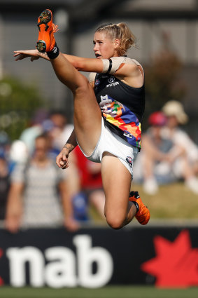 Tayla Harris launches a big kick. in 2019.