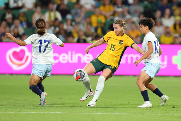 Clare Hunt of the Matildas takes control of the ball.