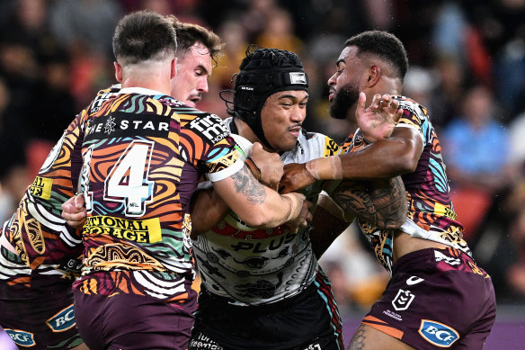 Penrith winger Brian To’o takes on the Brisbane defence.