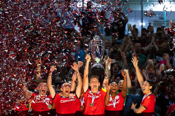 Adelaide United celebrate with the FFA Cup.