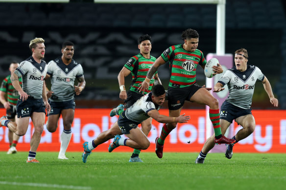 Latrell Mitchell makes a break against the Storm.