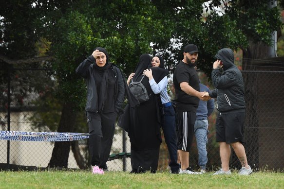 Family and friends gather near where Mejid Hamzy was shot dead. 