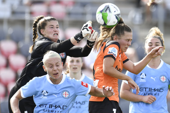 City keeper Teagan Micah stops another Brisbane effort.