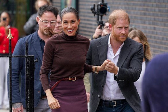 Harry and his wife Meghan, Duchess of Sussex, appear in Nottingham last week. 