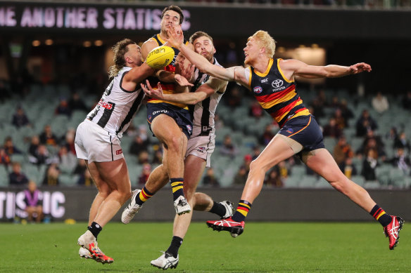 Collingwood's Jordan Roughhead (second right) was crunched in this collision.