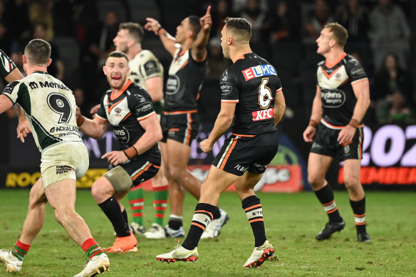 Luke Brooks sinks South Sydney with a field goal in 2022, but the halfback rarely lived up to the hype and has been a punching bag for Tigers fans.