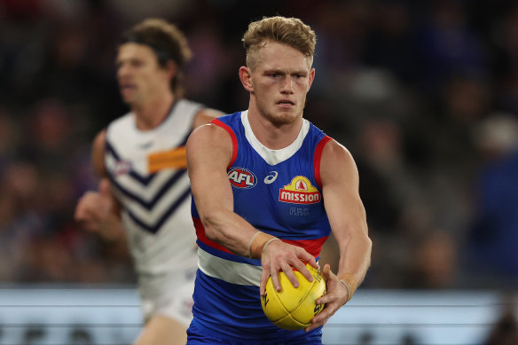 Adam Treloar of the Western Bulldogs played his 50th game at a third club against Fremantle at Marvel Stadium.