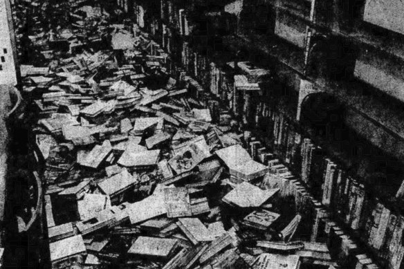 Books lay strewn over the floor of Footscray library in 1981.