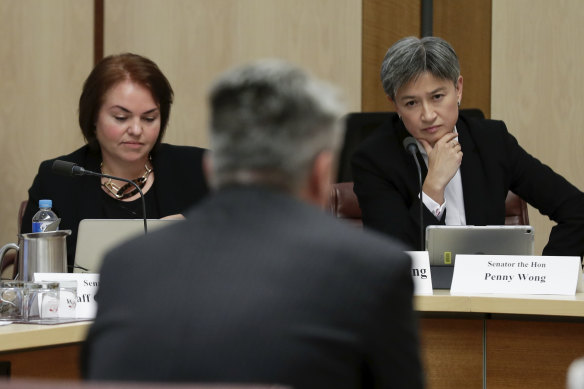 Senator Kimberley Kitching and Senator Penny Wong in a Senate estimates hearing.