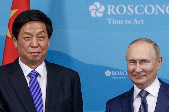 Russian President Vladimir Putin, right, and Chairman of National People’s Congress Li Zhanshu on the sidelines of the Eastern Economic Forum in Vladivostok, Russia.