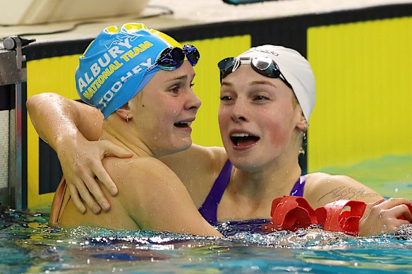 Sienna Toohey (left) in tears after winning the women’s 100m breaststroke final at the Australian swimming trials in Adelaide.