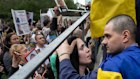 Olena and her husband Oleksandr Negyr embrace after his release from a Russian prison after 22 months.