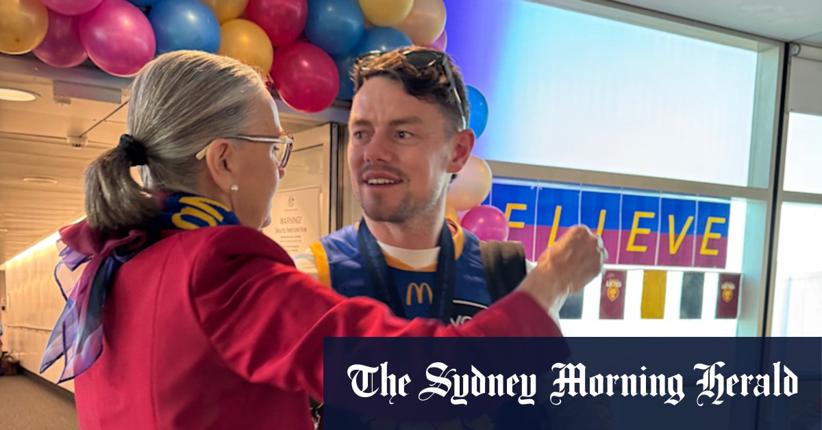 Fans welcome triumphant Lions at Brisbane Airport