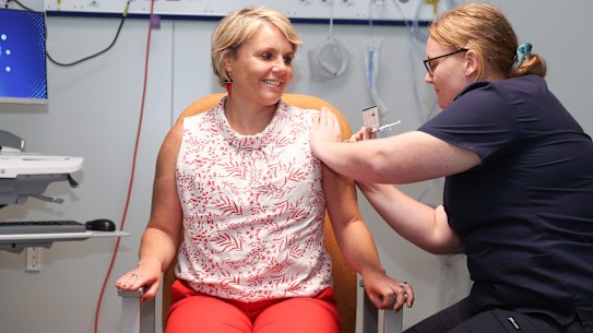 Labor MP Peta Murphy received her first COVID-19 vaccination from registered nurse Michelle Keaveney on Tuesday morning.