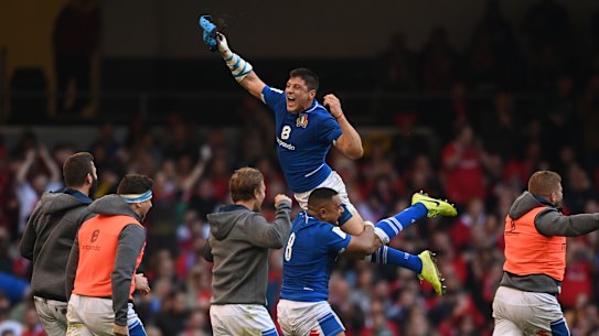 CARDIFF, WALES - MARCH 19: Italy centre Juan Ignacio Brex is lifted high by Toa Halafihi during the celebrations after the Six Nations Rugby match between Wales and Italy at Principality Stadium on March 19, 2022 in Cardiff, Wales. (Photo by Stu Forster/Getty Images)