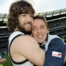 Max Rooke and former Cats coach Mark Thompson after the 2009 AFL grand final.
