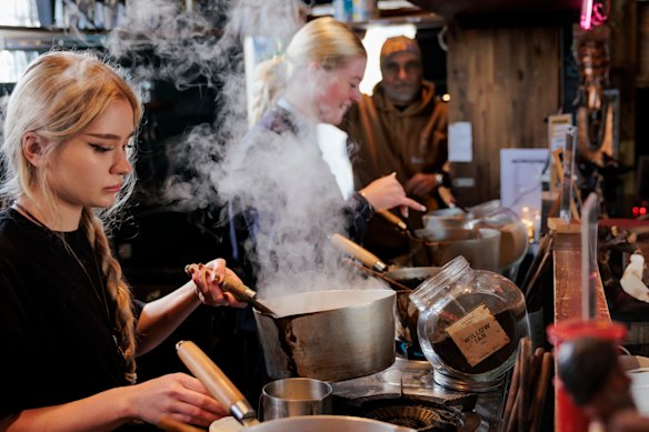 Chai is brewed to order in simmering pots of tea and milk at Ambi’s.