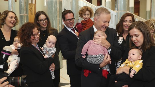 Labor leader Anthony Albanese with MPs Alicia Payne, Amanda Rishworth, Matt Keogh, Anika Wells and Kate Thwaites as he greets their new babies last year. 
