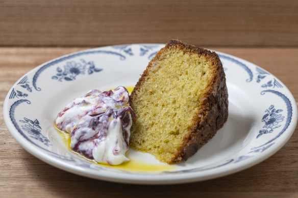 Olive oil cake with fruit-swirled yoghurt.