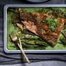 One tray baked fish and creamed greens.