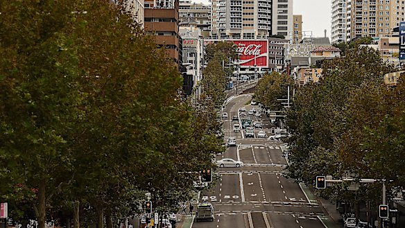 A very empty William Street in Sydney on Wednesday during what would normally be heavy peak-hour traffic.
