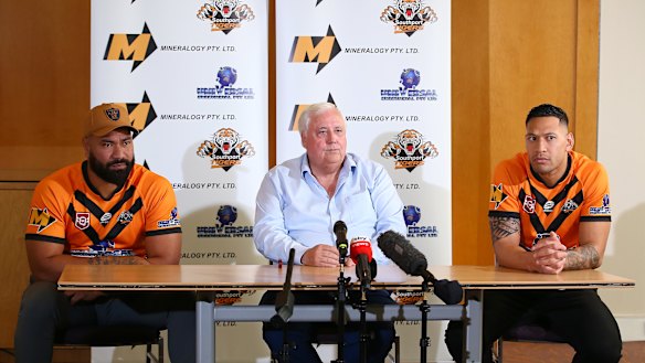 Tony Williams, Clive Palmer and Israel Folau speak at a press conference at the Hilton Hotel on July 9, 2021 in Brisbane, Australia. 