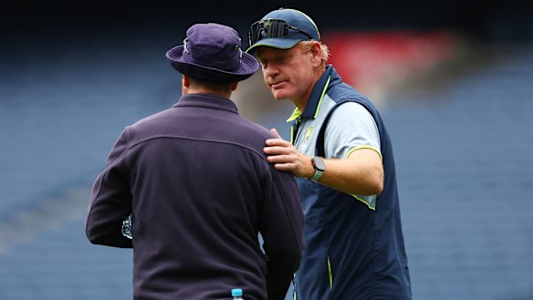 MCG curator Matt Page speaks to Australia coach Andrew McDonald on December 24.