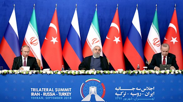 From left: Russian President Vladimir Putin, Iran's Hassan Rouhani and Turkey's Recep Tayyip Erdogan after they failed to agree on a diplomatic solution  in Tehran, Iran, on Friday.