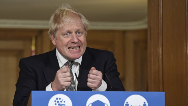 Prime Minister Boris Johnson announces the lockdown during a Downing Street press conference.