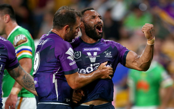 Justin Olam celebrates a try against Canberra.