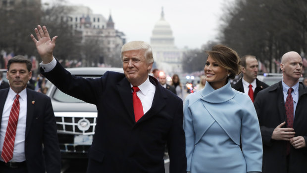 The President and first lady on parade after the inauguration.