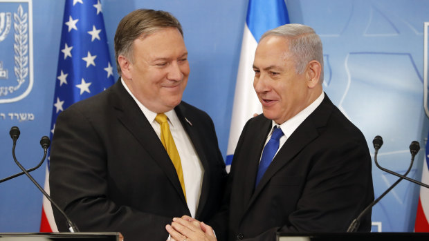 US Secretary of State Mike Pompeo. left. is greeted by Israeli Prime Minister Benjamin Netanyahu  in Tel Aviv, on Sunday.