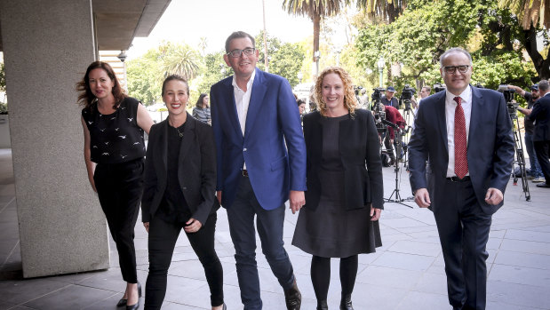Premier Daniel Andrews (centre) with new members of his ministry - Jaclyn Symes, Gabrielle Williams, Melissa Horne and Adem Somyurek.