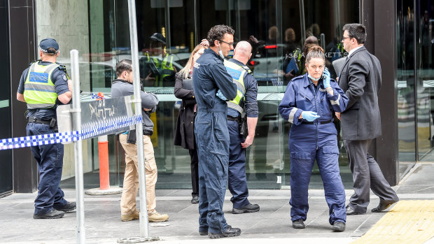 Police outside the Eq Tower, where a man died on Friday morning.