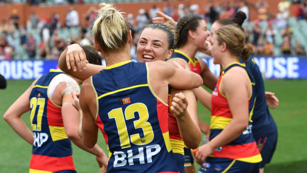 Erin Phillips and Ebony Marinoff celebrate after the siren.